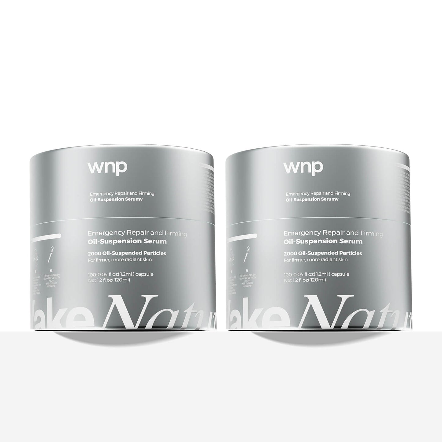 Two containers of wnp Emergency Repair and Firming Oil Suspension Serum on a white background