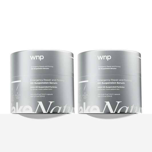 Two containers of wnp Emergency Repair and Firming Oil Suspension Serum on a white background