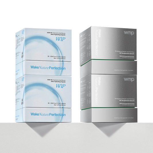 Two boxes of WNP skincare products on a white background