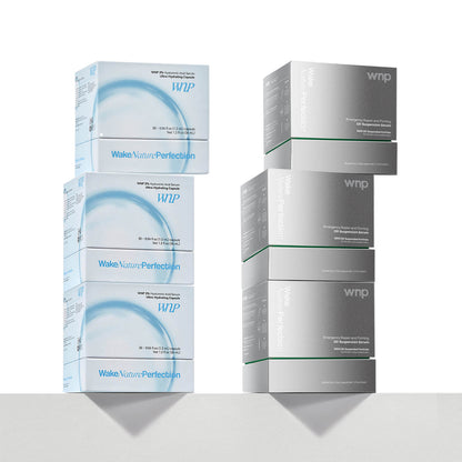 Stacks of WNP skincare product boxes on a white background