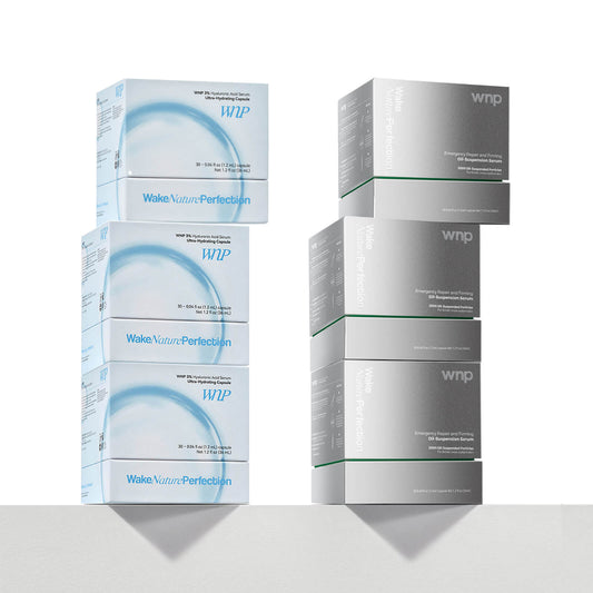 Stacks of WNP skincare product boxes on a white background