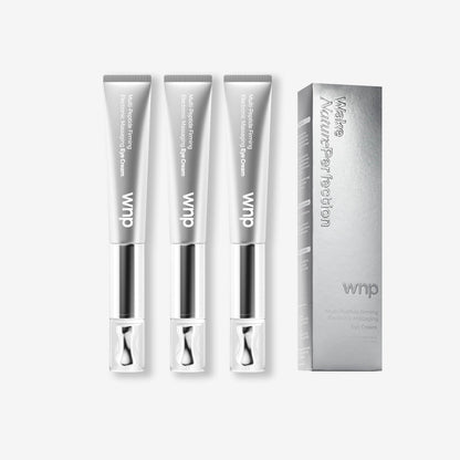 Three eye cream tubes and their packaging on a white background
